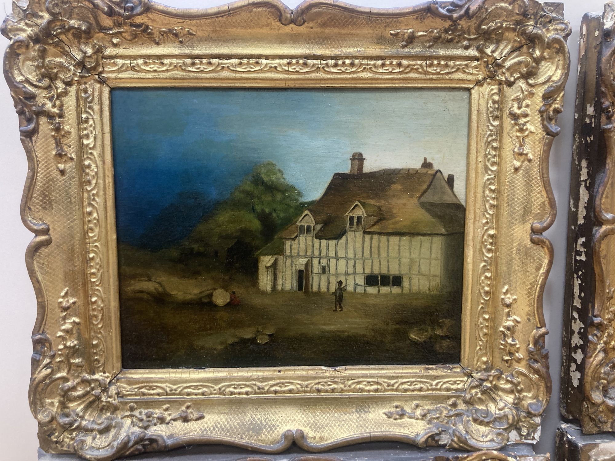 19th century Welsh School, set of 4 oils on panel, Primitive landscapes with figures beside a church, tavern and timber beamed houses,